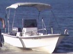 Brad by boat.jpg