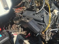 New exhaust on OMC V6 with longer bolts for alignment.jpg