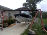 Boat hanging from rigging from bow.jpg