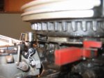 cam roller resting against flywheel.JPG