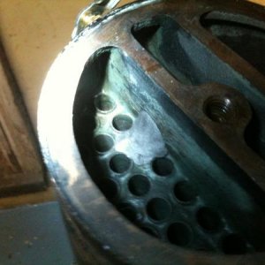 Note the plugged tube. there were two, i did both with a rubber plug pressed in the hole then used J-B stick weld to make a plug to hold that in. it h