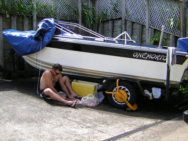 This boat has better hull for rough weather in harbour plus the power to boot.
Cleaning catch of the day, Red snapper